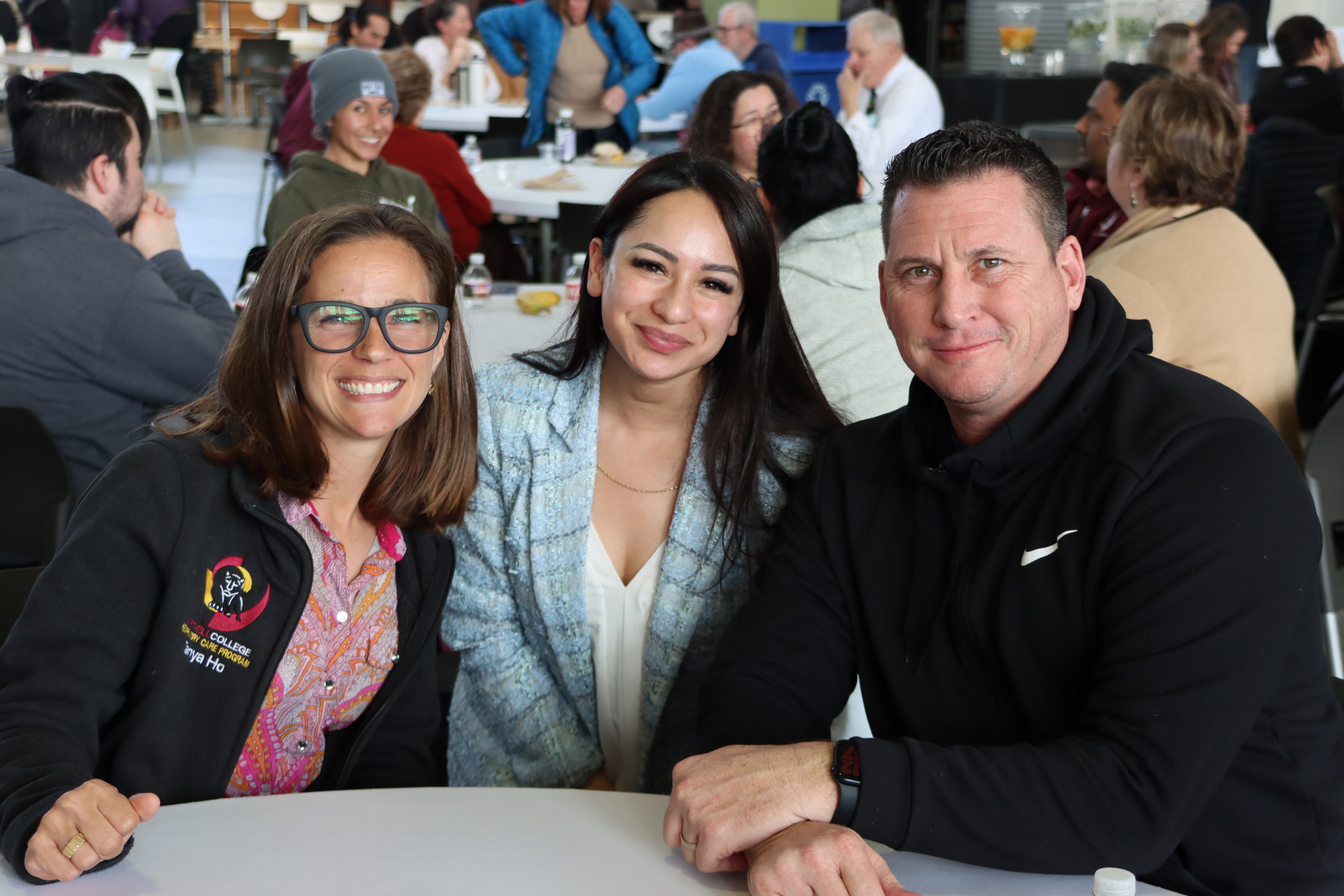 Photo of staff smiling at camera